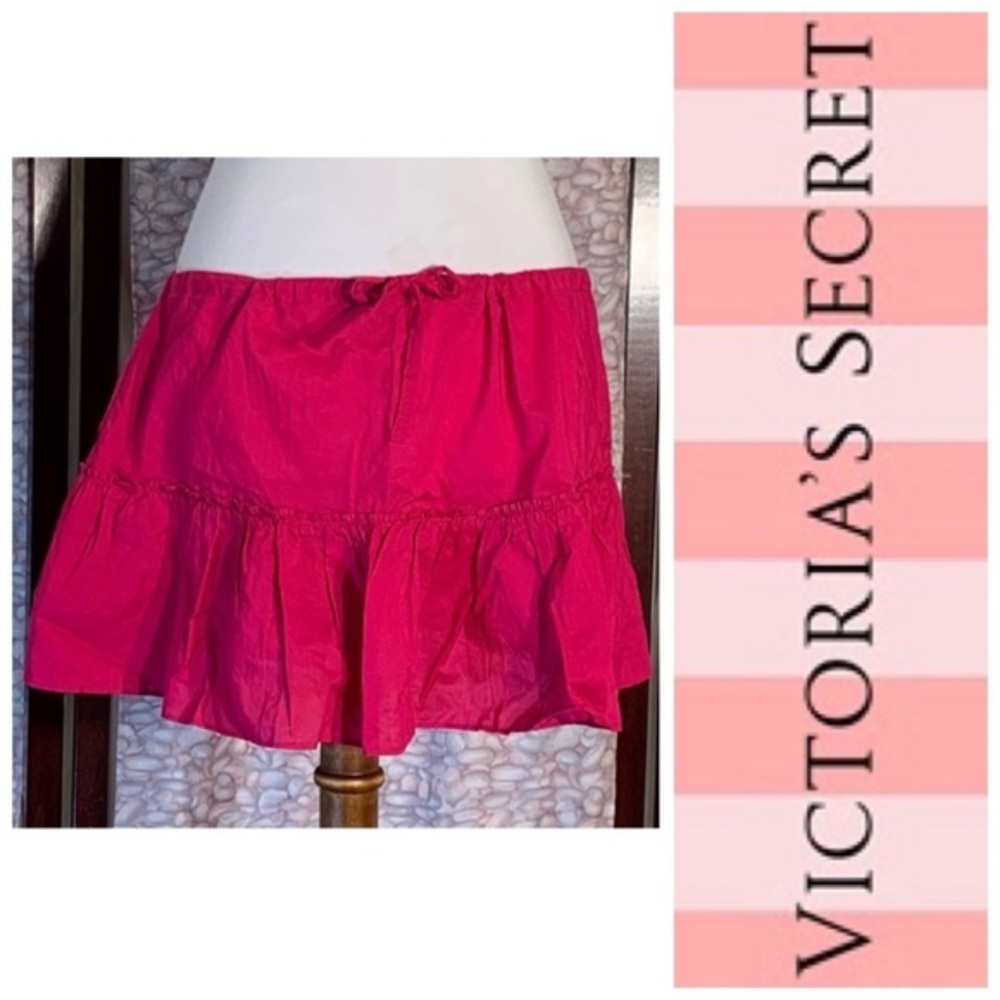 Victoria’s Secret fuchsia swim cover skirt.